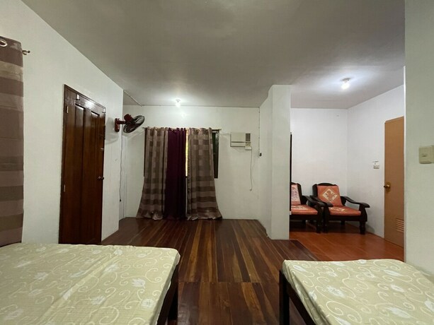 Imagen de la habitación del Hostel OYO 796 Southpoint And Restobar. Foto 11