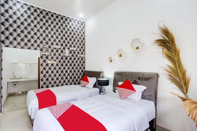 Imagen de la habitación del Hostel OYO 90124 Oemah Ratu Syariah. Foto 2