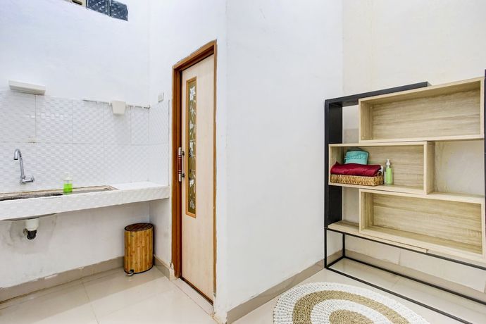 Imagen de la habitación del Hostel OYO 90124 Oemah Ratu Syariah. Foto 5