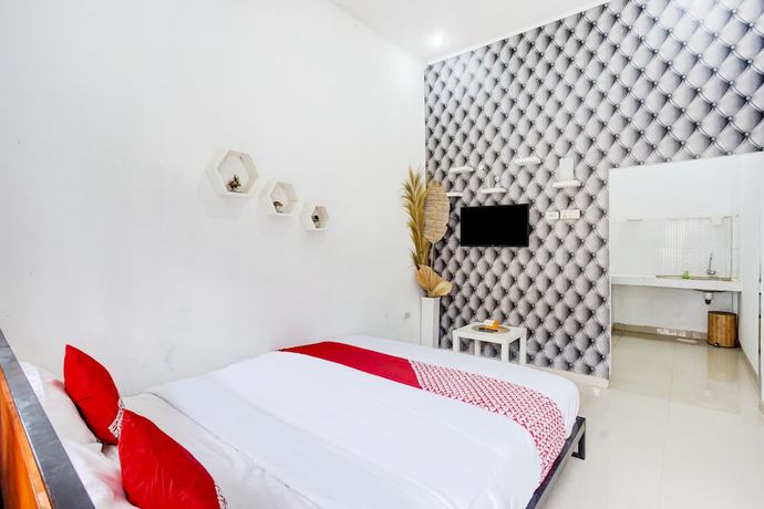 Imagen de la habitación del Hostel OYO 90124 Oemah Ratu Syariah. Foto 9