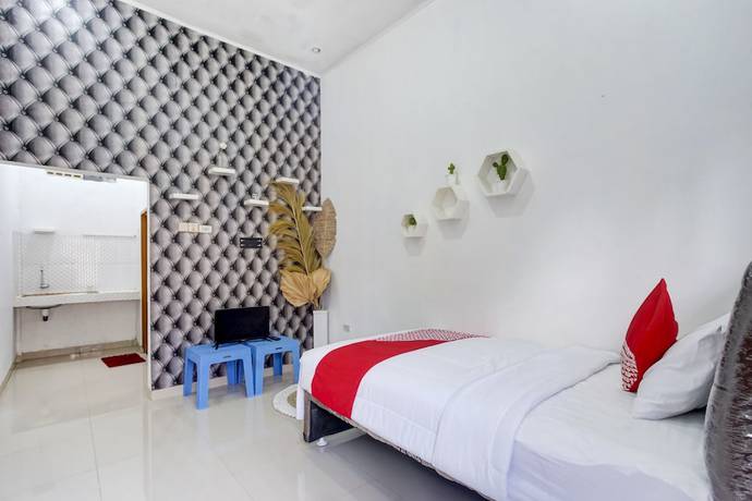 Imagen de la habitación del Hostel OYO 90124 Oemah Ratu Syariah. Foto 10