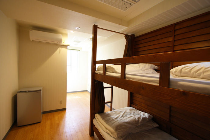 Imagen de la habitación del Hostel Okinawa Guest House Grand Naha -. Foto 12