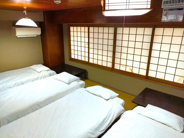 Imagen de la habitación del Hostel Osaka Guest House Sakura &ndash;. Foto 14