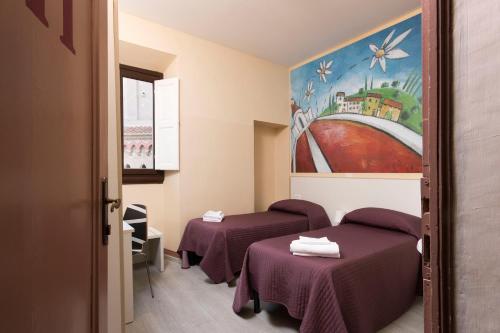 Imagen de la habitación del Hostel Ostello 7 Santi. Foto 11