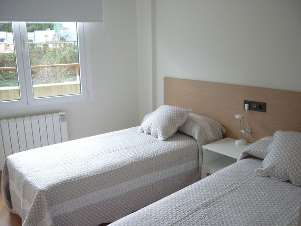 Imagen de la habitación del Hostel Pensión Albergue Puente Ribeira. Foto 8