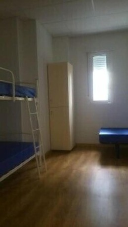 Imagen de la habitación del Hostel Pensión Albergue Puente Ribeira. Foto 9