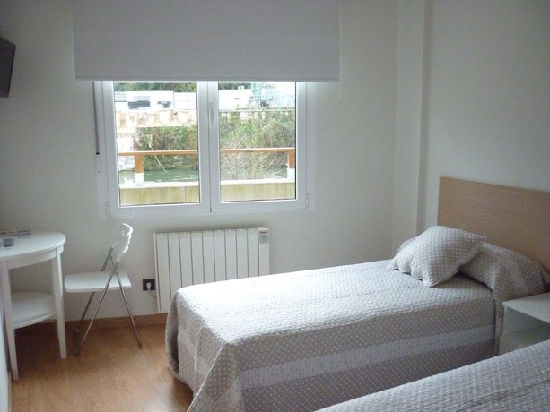 Imagen de la habitación del Hostel Pensión Albergue Puente Ribeira. Foto 16