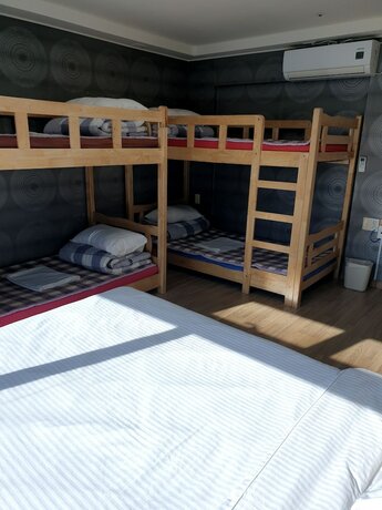Imagen de la habitación del Hostel Popcorn Haeundae. Foto 15