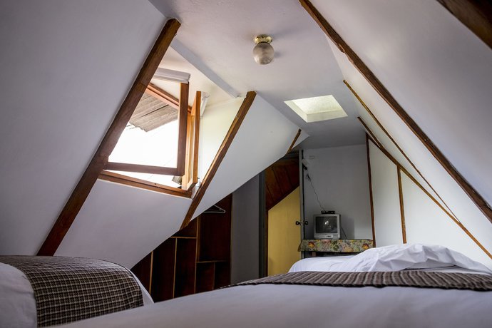 Imagen de la habitación del Hostel Posada del Maple. Foto 11