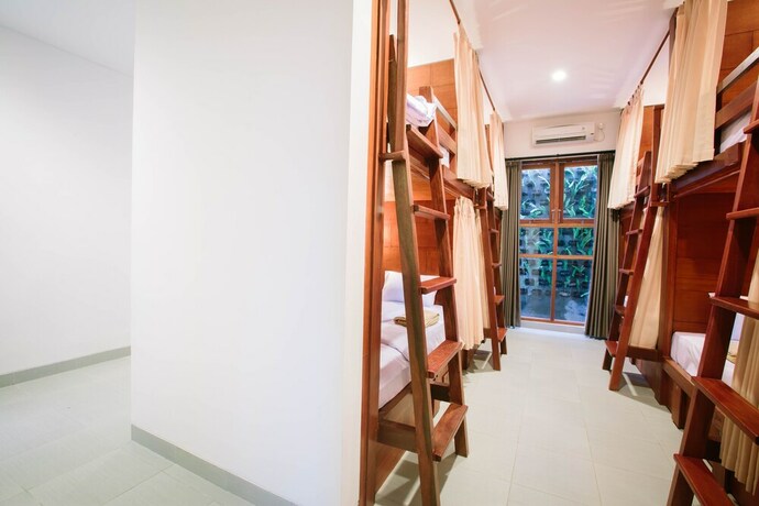 Imagen de la habitación del Hostel Pudak Sari Unizou. Foto 11
