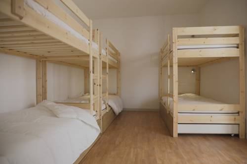 Imagen de la habitación del Hostel Puerto Nest. Foto 4