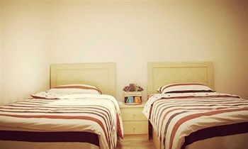 Imagen de los interiores del Hostel Qingdao Yuezhu Topic. Foto 15
