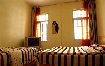 Imagen de la habitación del Hostel Qingdao Yuezhu Topic. Foto 14