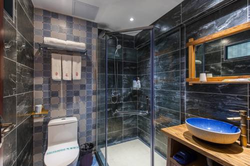 Imagen de la habitación del Hostel Riverside Inn Guilin Central. Foto 2