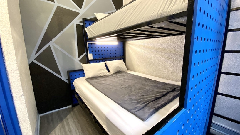 Imagen de la habitación del Hostel Roomies Roma. Foto 15