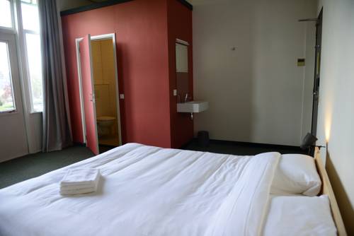 Imagen de la habitación del Hostel Roots, Tilburg. Foto 9