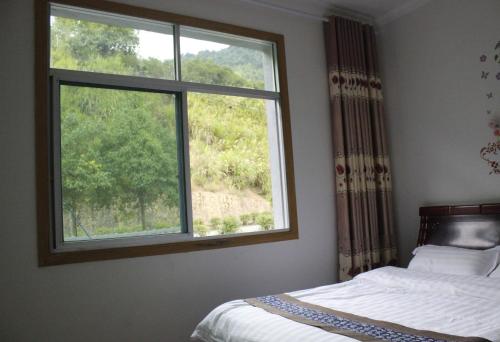 Imagen de la habitación del Hostel Sanqingshan Mountain House Youth. Foto 8