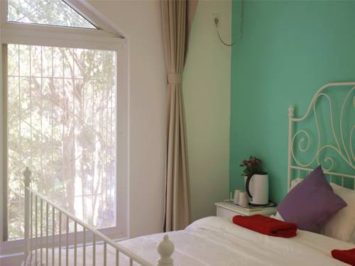 Imagen de la habitación del Hostel Sanya Backpacker International Youth. Foto 5