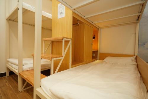 Imagen de la habitación del Hostel Shanghai Meego Youth. Foto 7