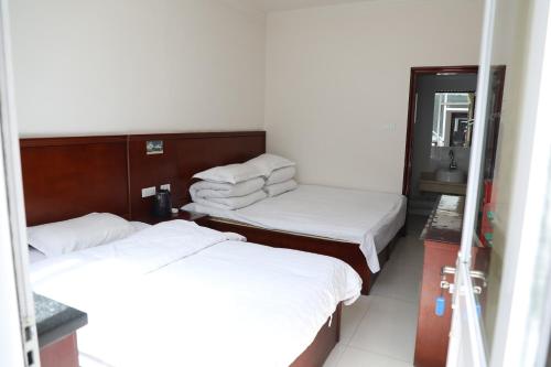 Imagen de la habitación del Hostel Shannong. Foto 7