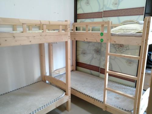 Imagen de la habitación del Hostel Shenzhen 8090 International Youth East Stat. Foto 8