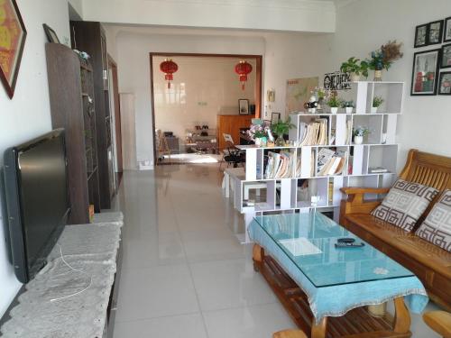 Imagen general del Hostel Shenzhen 8090 International Youth East Stat. Foto 3