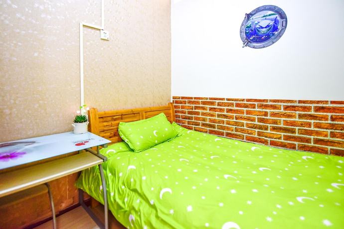 Imagen de la habitación del Hostel Shu Xu Internet. Foto 12
