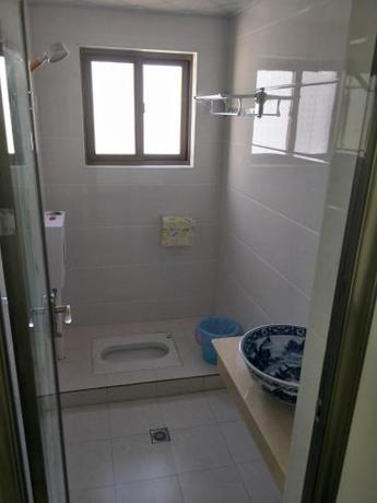 Imagen de la habitación del Hostel Si Yuan Xi Wu Yuan. Foto 8