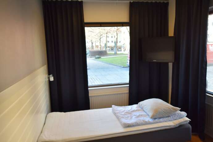 Imagen de la habitación del Hostel Snoozemore. Foto 20