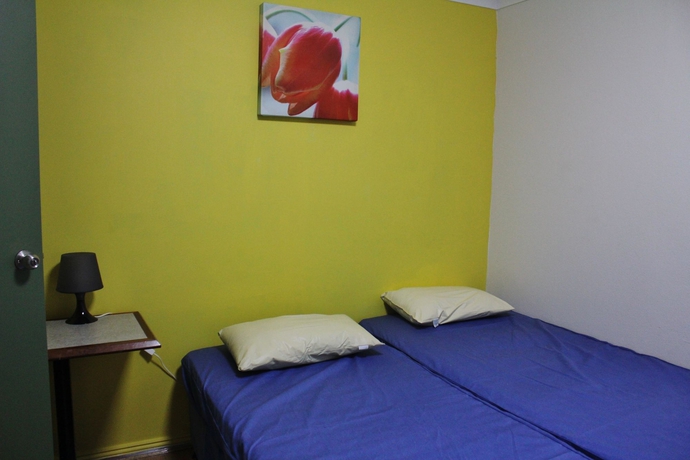 Imagen de la habitación del Hostel Sydney Backpackers -. Foto 12