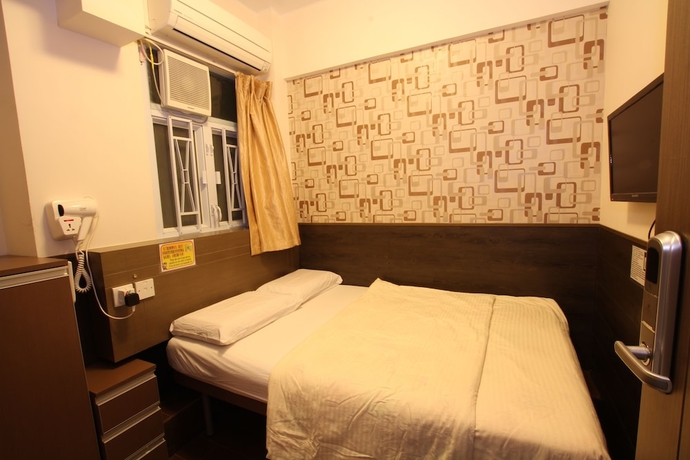 Imagen de la habitación del Hostel Tai Wah Boutique. Foto 2