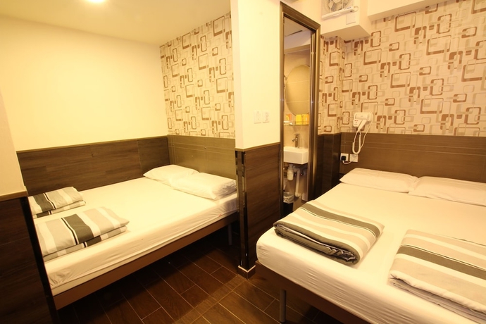 Imagen de la habitación del Hostel Tai Wah Boutique. Foto 4