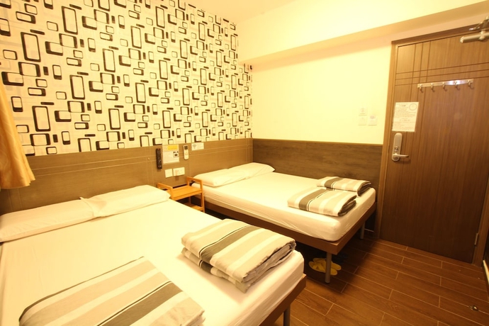 Imagen de la habitación del Hostel Tai Wah Boutique. Foto 8