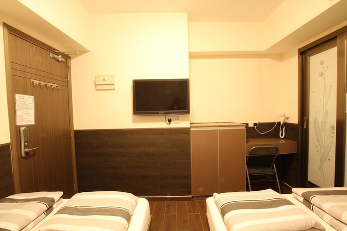 Imagen de la habitación del Hostel Tai Wah Boutique. Foto 10