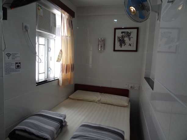 Imagen de la habitación del Hostel Tai Wah. Foto 4