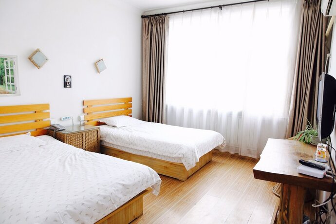 Imagen de la habitación del Hostel Taishan International Youth. Foto 2