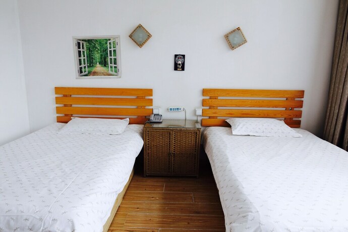 Imagen de la habitación del Hostel Taishan International Youth. Foto 11