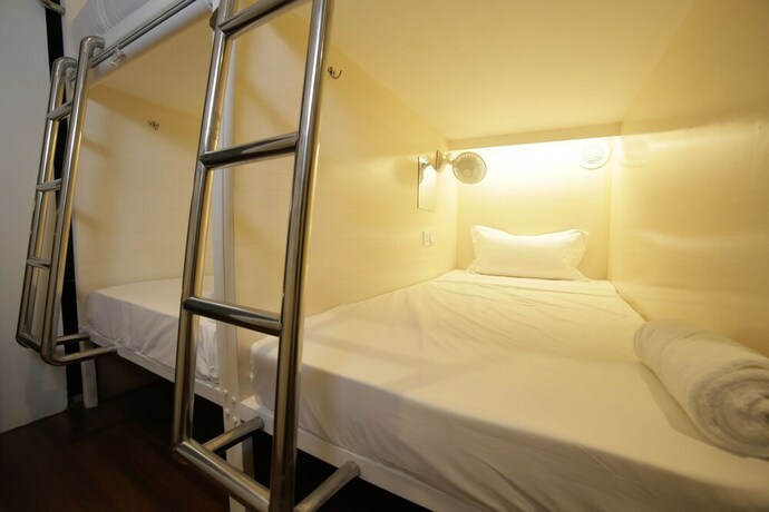 Imagen de la habitación del Hostel Tambayan Capsule. Foto 14