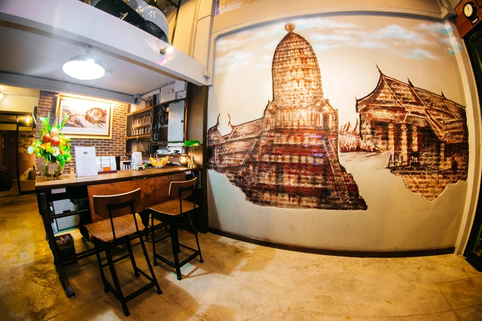 Imagen de los interiores del Hostel The 8 Factory Hotel Phitsanulok. Foto 19