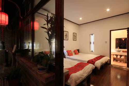 Imagen de la habitación del Hostel The Great Wall Courtyard. Foto 16