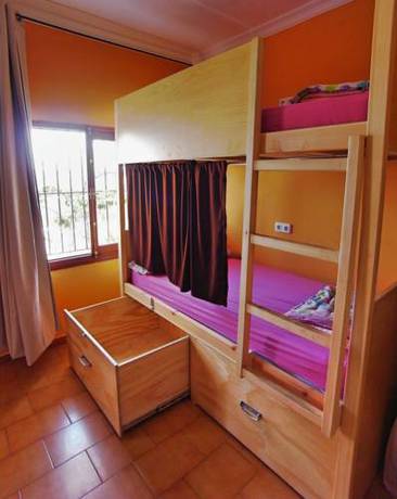 Imagen de la habitación del Hostel The Melting Pot Tarifa & Kiteschool. Foto 11