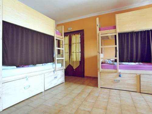 Imagen de la habitación del Hostel The Melting Pot Tarifa & Kiteschool. Foto 12