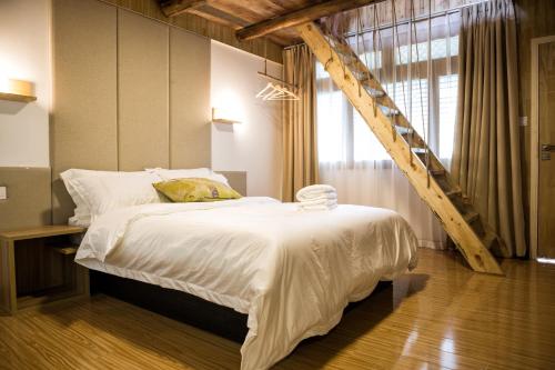 Imagen de la habitación del Hostel The Micro Mt.emei. Foto 7