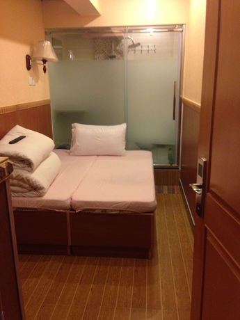 Imagen de la habitación del Hostel Venetian, Tsim Sha Tsui. Foto 2