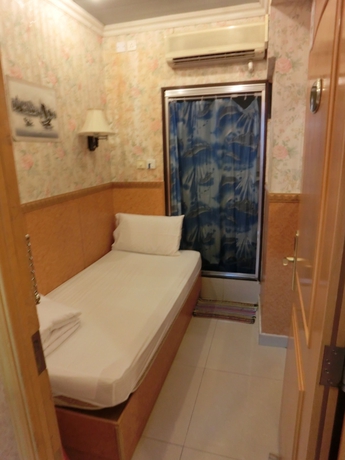 Imagen de la habitación del Hostel Venetian, Tsim Sha Tsui. Foto 5
