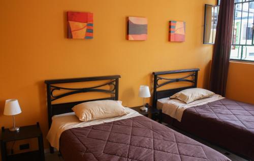 Imagen de la habitación del Hostel Wild Rover Huacachina. Foto 8