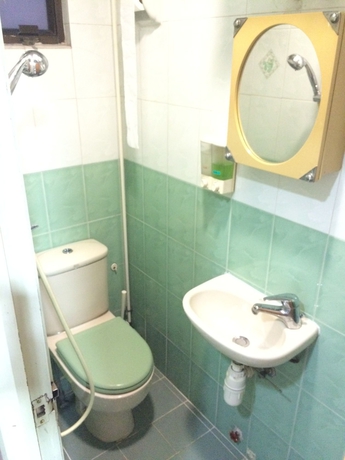 Imagen de la habitación del Hostel Wing Wah. Foto 4