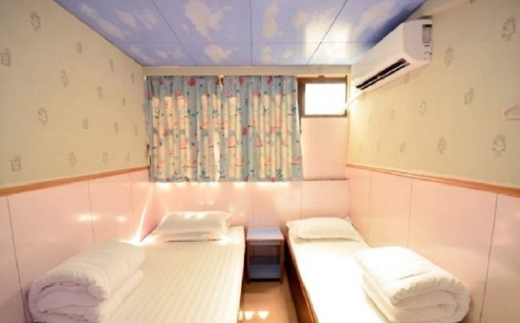 Imagen de la habitación del Hostel Wing Wah. Foto 5
