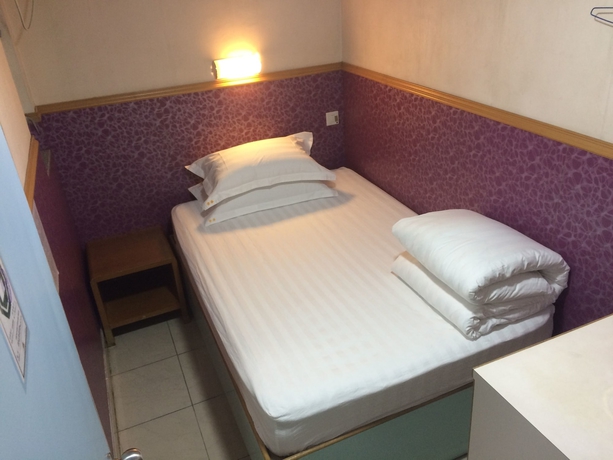 Imagen de la habitación del Hostel Wing Wah. Foto 7