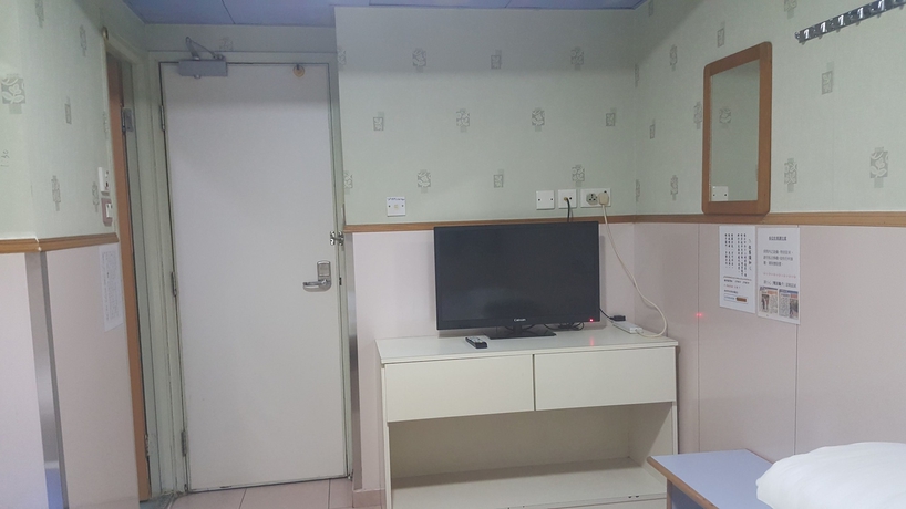 Imagen de la habitación del Hostel Wing Wah. Foto 8